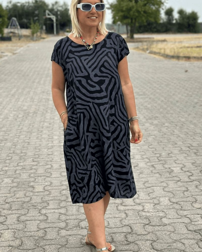 Saga™ | Sommarklänning med vintagekänsla